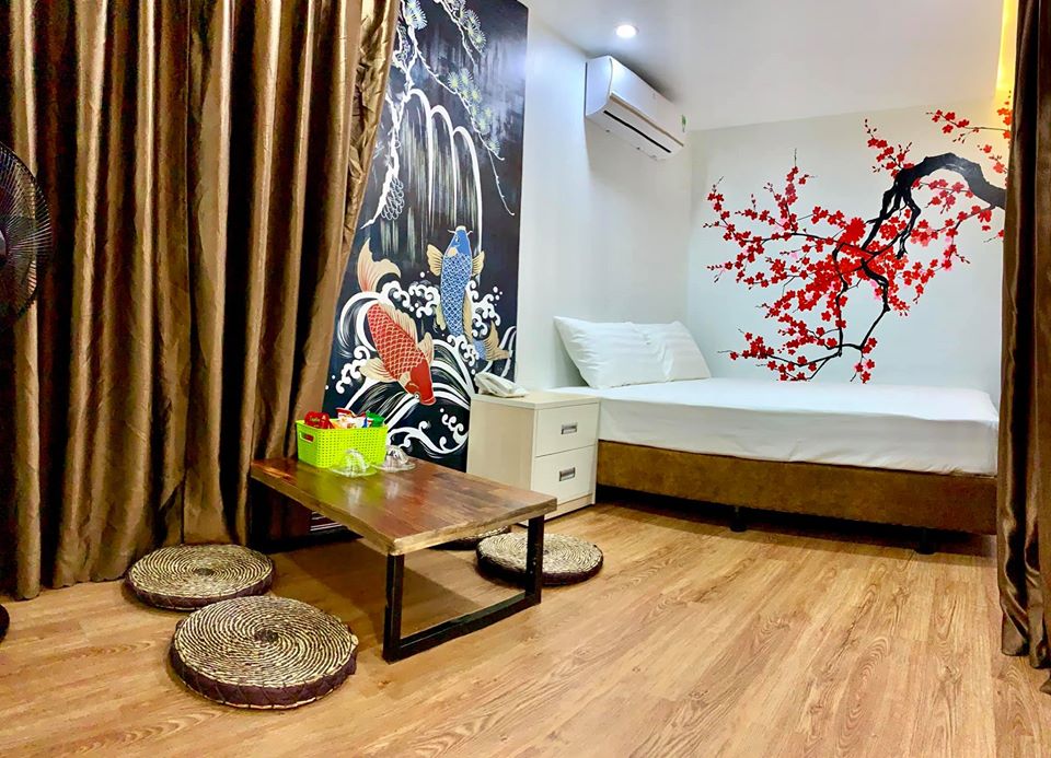 review-Rainbow-Hotel-Cửa-L&ograve;-hoa-anh-đ&agrave;o